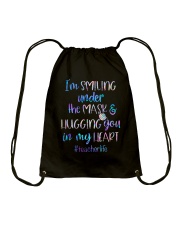 I'm smiling under the mask Drawstring Bag tile