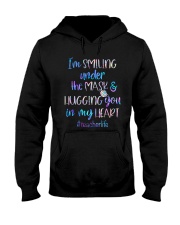 I'm smiling under the mask Hooded Sweatshirt tile