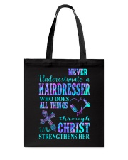 Never underestimate a hairdresser Tote Bag tile