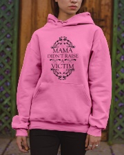 MAMA DIDN'T RAISE A VICTIM Hooded Sweatshirt apparel-hooded-sweatshirt-lifestyle-front-03
