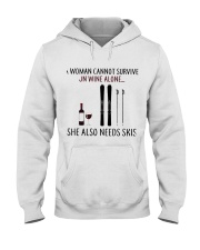 A Woman Needs Skis On Wine Hooded Sweatshirt thumbnail