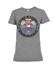LIVING IN FLORIDA WITH MICHIGAN ROOTS Premium Fit Ladies Tee tile