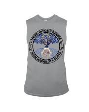 LIVING IN NORTH DAKOTA WITH MINNESOTA ROOTS Sleeveless Tee tile