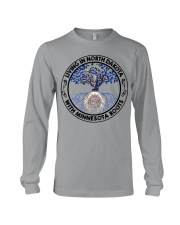 LIVING IN NORTH DAKOTA WITH MINNESOTA ROOTS Long Sleeve Tee tile