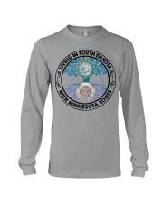 LIVING IN SOUTH DAKOTA WITH MINNESOTA ROOTS Long Sleeve Tee tile