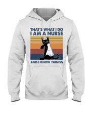 I Am A Nurse Hooded Sweatshirt tile