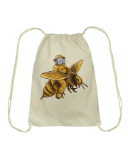 BEEKEEPER RIDING A BEE Drawstring Bag tile