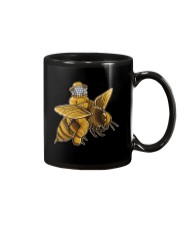 BEEKEEPER RIDING A BEE Mug tile