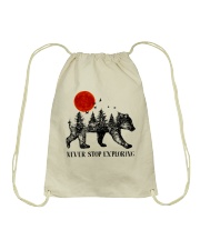 Never Stop Exploring Drawstring Bag thumbnail