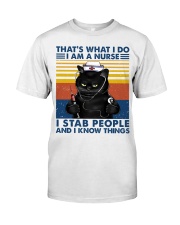 That's What I Do I Am A Nurse I Stab People Premium Fit Mens Tee tile
