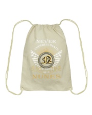 Never Underestimate NUNES - Name Shirts Drawstring Bag thumbnail