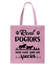 Real Doctors Treat More Than One Species Tote Bag tile