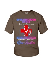 Knows More Than She Says Operating Room Nurse Youth T-Shirt tile