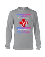 Knows More Than She Says Operating Room Nurse Long Sleeve Tee tile