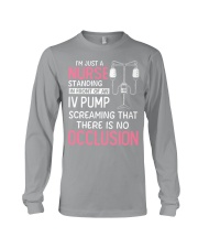 Nurse Standing In Front Of IV Pump Long Sleeve Tee tile