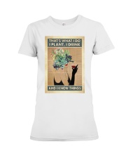Gardening That's what I do I plant I drink Premium Fit Ladies Tee tile