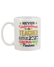 Never Underestimate A Teacher Who Survived 2020 Mug back