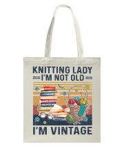 Knitting lady Tote Bag tile