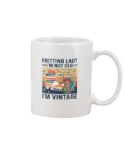 Knitting lady Mug tile