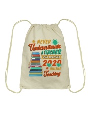 Never Underestimate A Teacher Who Survived 2020 Drawstring Bag tile