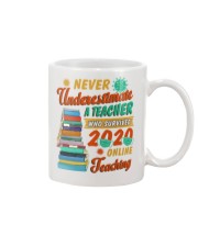 Never Underestimate A Teacher Who Survived 2020 Mug tile