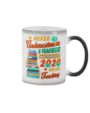 Never Underestimate A Teacher Who Survived 2020 Color Changing Mug tile