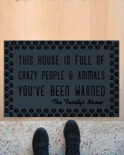 This house is full of crazy people n animals Doormat 22.5" x 15" aos-doormat-22-5x15-lifestyle-front-10