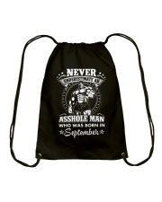 Never underestimate an asshole born in September Drawstring Bag tile