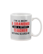 I'm A Mom A Grandma And A Retired Teacher Mug tile