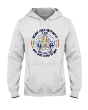 Never Underestimate Hooded Sweatshirt tile