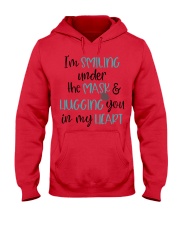I'm smiling under the mask Hooded Sweatshirt tile