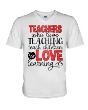 TEACHERS WHO LOVE TEACHING TEACH CHILDREN TO LOVE V-Neck T-Shirt thumbnail