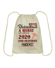 Never Underestimate a Nurse Drawstring Bag thumbnail