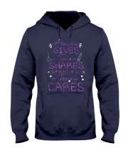 a Teacher cares Hooded Sweatshirt thumbnail