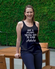 JUST A MOM TRYING NOT TO RAISE A HOLES Ladies Flowy Tank lifestyle-bellaflowy-tank-front-1