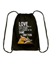 love is not looking at each other it's looking in Drawstring Bag tile