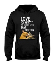 love is not looking at each other it's looking in Hooded Sweatshirt tile