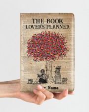The Book Lover's Planner Medium - Leather Notebook aos-medium-leather-notebook-lifestyle-front-01