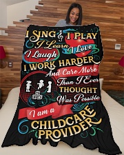 I am A Childcare Provider Large Fleece Blanket - 60" x 80" aos-coral-fleece-blanket-60x80-lifestyle-front-04