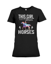 This girl rungs on Jesus and horses Premium Fit Ladies Tee tile