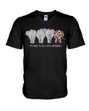 it's okay to be a little different V-Neck T-Shirt tile