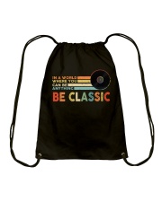 In A World Where You Can Be Anything Be Classic Drawstring Bag tile
