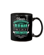 NEVER UNDERESTIMATE AN ENGINEER Mug thumbnail