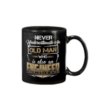 NEVER UNDERESTIMATE AN ENGINEER Mug thumbnail