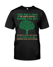 Tree-are-a-poem-the-earth-erites-across-the-sky-humanity-cuts-them-down-for-paper-so-we-man-record-ou-emptiness Premium Fit Mens Tee front