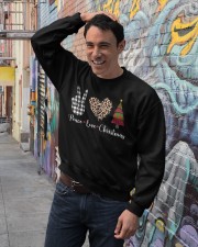 Peace Love Christmas Crewneck Sweatshirt lifestyle-unisex-sweatshirt-front-4