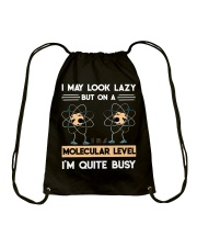 MAY LOOK LAZY BUT ON A MOLECULAR LEVEL Drawstring Bag tile