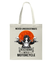 Never underestimate an old woman Tote Bag tile