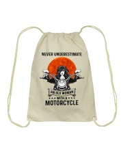 Never underestimate an old woman Drawstring Bag tile