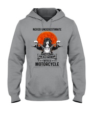 Never underestimate an old woman Hooded Sweatshirt tile